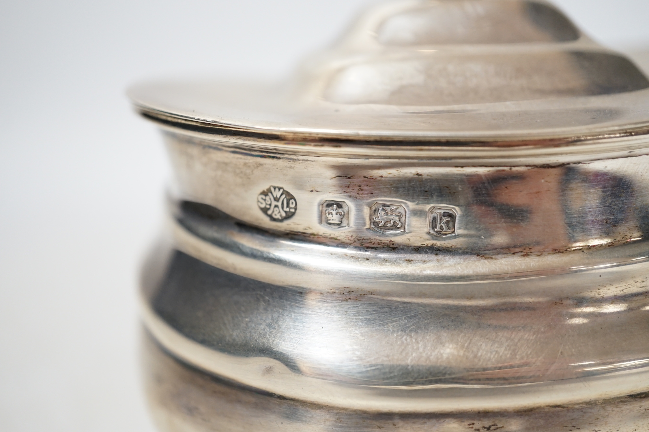 A George V silver oval tea caddy, William Hutton & Sons, Sheffield, 1927, width 93mm, 4.6oz.